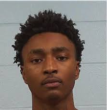 Derrick Gaither is held