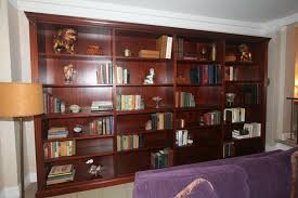 You can also place floating shelves on both sides of the bed to carry the books for you. Home Staging New York The Art Of Arranging A Bookcase