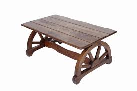 But, there's so much more a rustic furniture coffee table can offer you. Oak Wagon Wheel Western Coffee Table Measures 40 L X 22 W X 16 Hmeasures 40 L X 22 W X 16 H