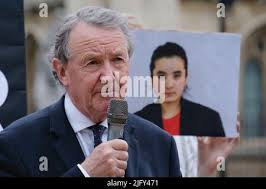 London, UK, 5th July, 2022. Lord Alton joins Uyghur activists and other  supporters as they gathered