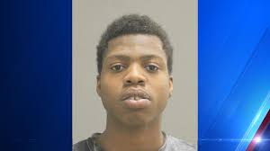 Two arrested after loaded guns and drugs found during traffic stop