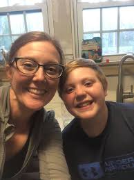Personal moment of a mom dancing in the kitchen