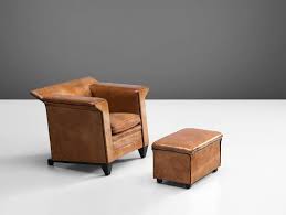 The most common chair and ottoman material is cotton. Mid Century Modern Patinated Cognac Leather Club Chair With Ottoman 1960s For Sale Club Chairs Leather Club Chairs Modern Rocking Chair