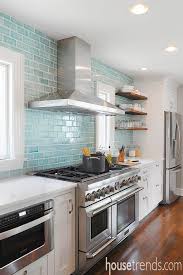 White Subway Tile Backsplashes Are A Timeless Classic This Updated Rendition Brings An Aqua Tinted Upda Blue Glass Tile Kitchen Tiles Kitchen Tiles Backsplash