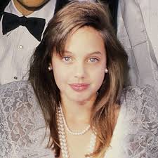 The young woman in the church. Angelina Jolie S Transformation Through The Years