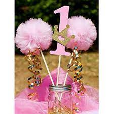 You can adorn your table with a slick pink tablecloth and pink decorations. Laventy Girls 1st Birthday Cake Topper Baby One Cake Topper Girls Baby Shower Centerpieces Blue Gray Its A Girls Centerpiece First Birthday Table Decoration Amazon In Home Kitchen