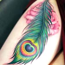 Is it good luck to find a peacock feather? Peacock Feather And Flower Tattoo Idea Feather Tattoos Peacock Tattoo Feather Tattoo Arm