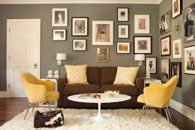 Mixing clean lines and soft curves brings comfort and calm to this design's blue, brown and gray decor. Gray Wall Brown Couch Houzz