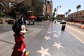 Many of its studios such as disney, paramount pictures, warner bros., and universal pictures were founded there; Coronavirus Is Battering The Hollywood Boulevard Economy Los Angeles Times