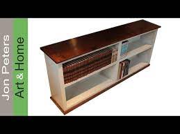 Sandwich a very narrow table between the sofa and the wall, so you can set frames, candles, plants or lamps on it for decoration and function. How To Build A Simple Bookcase Sofa Table Youtube