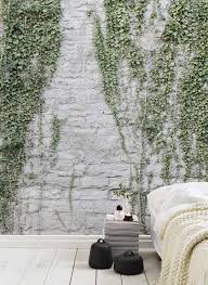 An all over wallpaper with a realistic digital print of a brick wall with a variegated pattern in shades of grey. Stylish Brick Effect Wallpaper Designs Brick Wallpaper Ideas