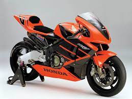 honda orange track bike honda motorcycles racing bikes honda bikes