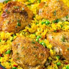 A Pan Of Arroz Con Pollo With Chicken Thighs Saffron Rice And Peas Saffron Recipes Chicken Thights Recipes Yellow Rice Recipes