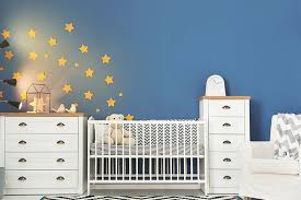 This modern eclectic baby boy's nursery has gray walls and white trim. 15 Cute Baby Boy Nursery Room Ideas