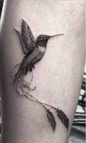 20 Stunning Hummingbird Tattoo Ideas Hummingbird Tattoo Bird Tattoos For Women Feather Tattoos