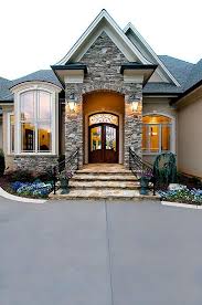 Symmetry is common in designs for entryway plantings. House Exterior House Design Dream House