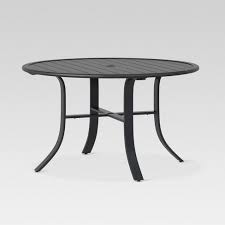 Spruce Up Your Patio With The Camden Round Dining Table From Threshold The Slatted Tabletop Is Made W Dining Table Black Patio Dining Table Round Patio Table