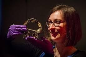 32521285-Edinburgh UK Mar 09 2016; Craig Angus, Assistant Curator with The  Torrs Pony Cap, 300-200bc from Dumfries and Galloway ahead of a major  exhibition, Celts, to open at the National Museum of