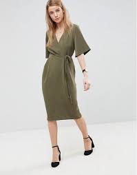 Get The Look 7 Surprisingly Summery Olive Dresses Inspired By Meghan Markle Olive Dress Outfit Wrap Dress Olive Dress