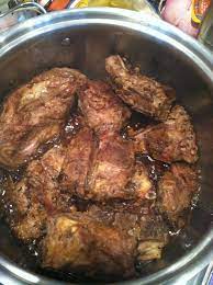 How long does it take for smoked neckbones to cook? Pork Neck Bones Browning Getting Ready For New Years Day Cooking Soul Food Pork Neck Bones Recipe Neckbone Recipes