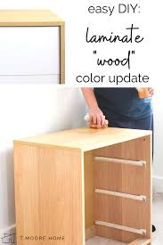 This combination works perfectly with heavier furniture in dark wood and metallic details. How To Stain Laminate Furniture Changing Colors Of Fake Wood T Moore Home Design Diy And Affordable Decorating Ideas