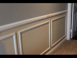 (this picture is of us adding the same faux wainscotting but in a different room. Wainscot Installation Tips Youtube
