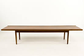 Located in los angeles, ca. Mcm Long Drexel Coffee Table Bench From Modern Hill Of Countryside Il Attic