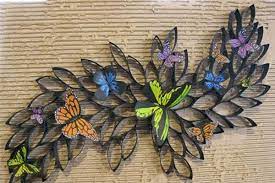 In addition to upcycling what most people would consider trash, we created beautiful wall art using toilet items needed: Diy Toilet Paper Roll Flower Wall Art