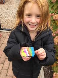 Gnome USA edition stickers and inspirational rocks in parks