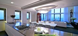 Teal cabinetry and upholstery add a pop of contemporary colour. Open Plan Kitchen Dining Living Room Modern Whaciendobuenasmigas