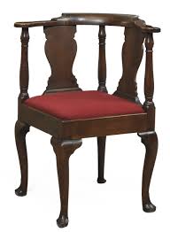 Larger groupings, like this set of eight chairs, typically sell for more than singular seats. A Queen Anne Maple And Walnut Corner Chair