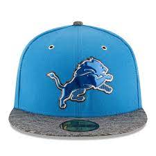 The new design prominently features a giant letter l. New Era 59fifty Detroit Lions New Era Blue Heathered Gray 2016 Nfl Draft On Stage Fitted Hat