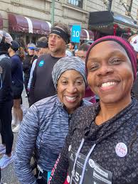 Walter Pickens receives his finisher trophy from Lois