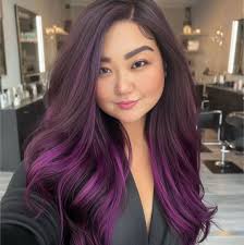 Community members are tying ribbons around trees near Annunciation Church  in south Minneapolis, where two children were killed in a shooting  Wednesday morning. The shooter injured 17 people, 14 of them children.