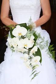 White orchid and rose bridal bouquet. Pin By Thuja Floral Design On Bouquet Inspiration Wedding Bridal Bouquets Spring Wedding Bouquets White Orchid Bouquet