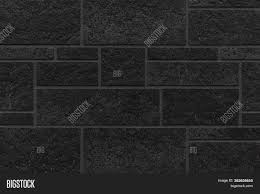 Marble tiles seamless flooring texture for background and design. Block Pattern Of Black Stone Cladding Wall Tile Texture And Seamless Background Image Stock Photo 382636655