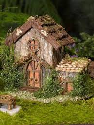 48 Fantastic Fairy Gardens For Your Yard Gardenvines Cabane Dans Les Arbres Feerique Jardin De Maison Feerique Jardin Miniature