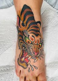 Trad tiger done by Andrew at Gilded Mermaid in Charleston, SC : rtattoos