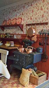 Closeup View Of A Dollhouse Kitchen With Range And Firewood Miniature Dollhouse Furniture Doll House Dolls House Interiors