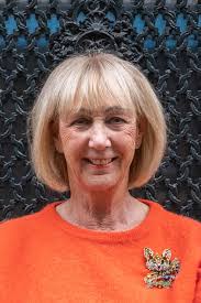 Long denim skirt with a fluffy orange jumper