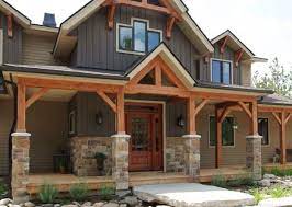 Today, chair rail is used more as a type of decorative element. Love The Dark Vertical Siding With Wood Trim Beautiful Porch House Siding Rustic House House Exterior