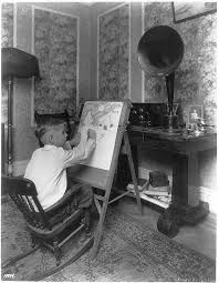 Master Harold Shaver of Jersey City learns to draw by listening in to  lessons broadcast by WOR