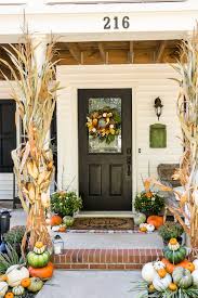 Tie corn stalks onto the fence and add a few extra decorations at the base. Easy Elegance Series Gorgeous And Simple Fall Decorating Ideas