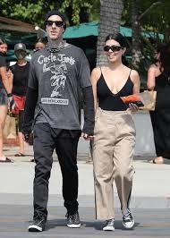 Kourtney Kardashian Wears Deep Plunge Top With Travis Barker On Malibu Day Date