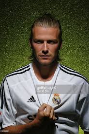 The david beckham mohawk or david beckham fauxhawk? Football Player David Beckham Wears His Real Madrid 23 Shirt On David Beckham Soccer David Beckham Football Beckham Football