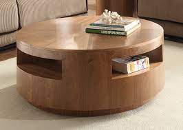 The table is large enough for several. 19 Really Amazing Coffee Tables With Storage Space Round Coffee Table Living Room Coffee Table Design Round Wood Coffee Table