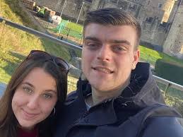 Murder-accused boyfriend 'found lying in bed next to body of Canadian  lover'