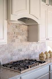 Browse photos of kitchen designs. A Full Wall Subway Patterned Silver Travertine Backsplash Is Surrounded By Custo Trendy Kitchen Backsplash Kitchen Backsplash Designs Kitchen Tiles Backsplash
