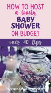 Small cardboard boxes painted to look like alphabet building blocks serve double duty for a baby shower: 40 Cheap Baby Shower Ideas Tips On How To Host It On Budget