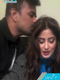 Sajal Aly cut her birthday cake with Makeup artist Adnan Ansari. Like,...